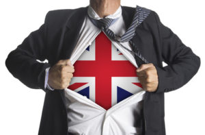 United Kingdom Flag with businessman showing a superhero suit un